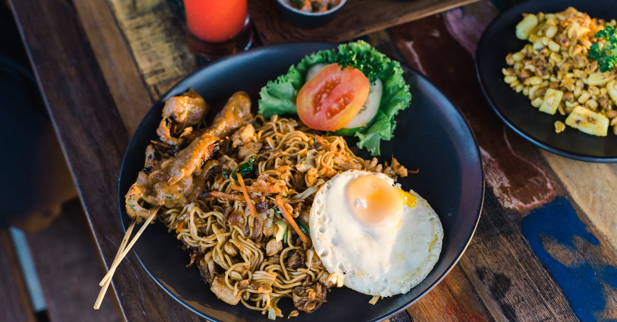 How to prevent cooked noodles & dumplings from getting soggy - Cooked Food on Black Ceramic Plate