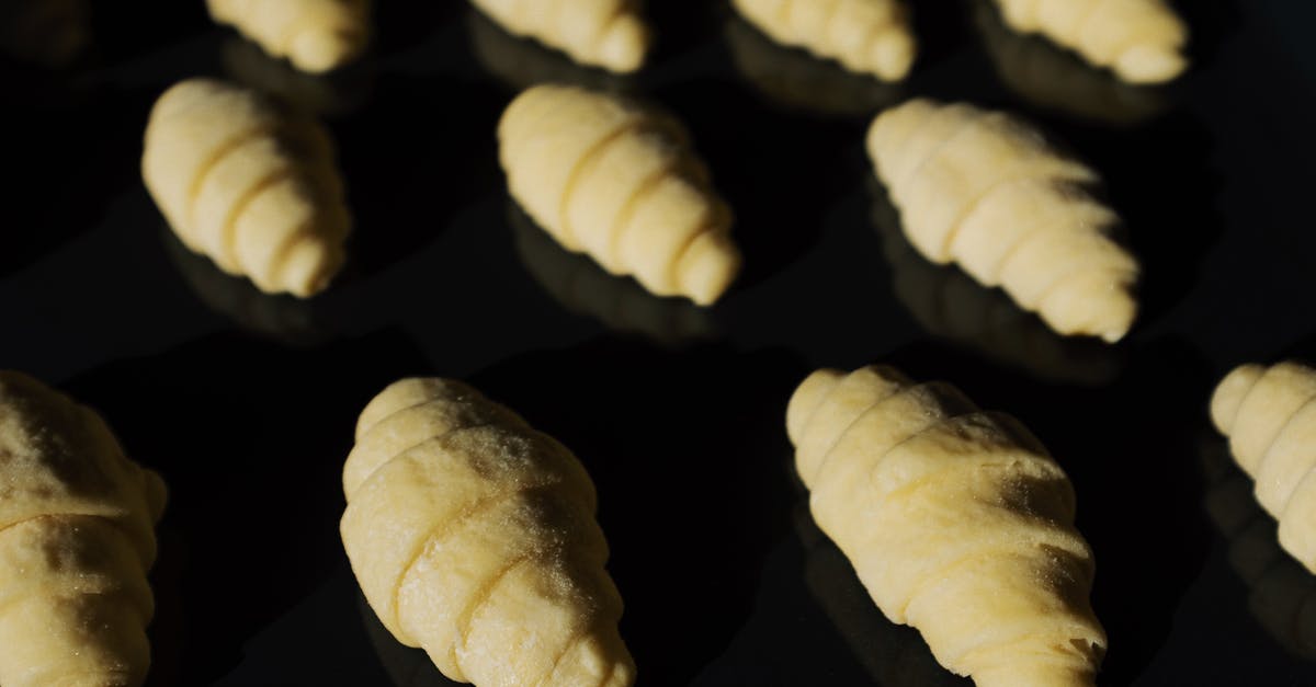 How to proof croissants in the hot weather? - Black Tray with Croissants