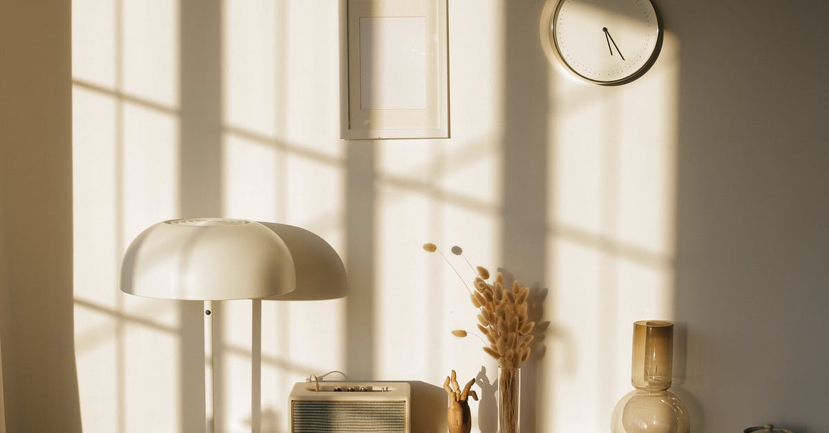 how to quickly dry out home made marshmallows? - Light room with retro radio and decorative vases with dry plants on desk near wall with clock and window shadow in sunlight