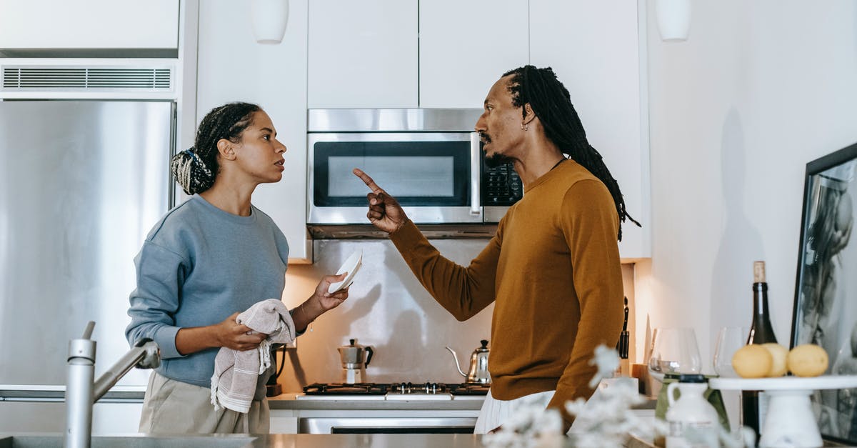 How to raise the setting and melting point of gelatin - Annoyed black man threatening girlfriend during conflict in kitchen