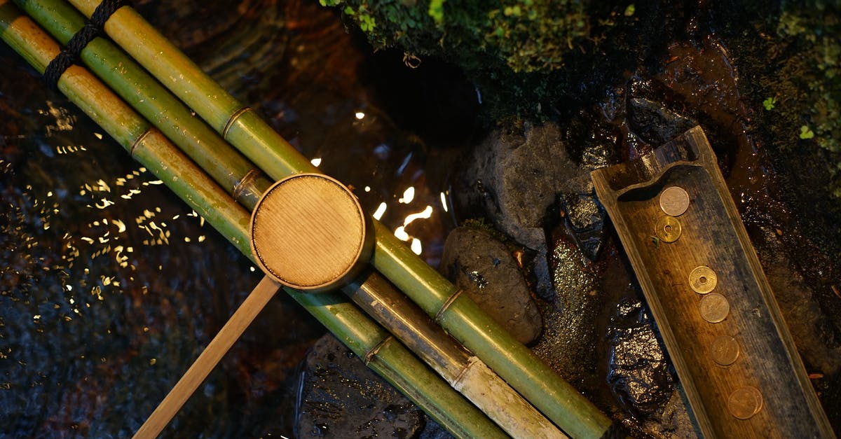 how to regain moisture into already made cold rolls/spring rolls - Bamboo water pipes with dipper near brook