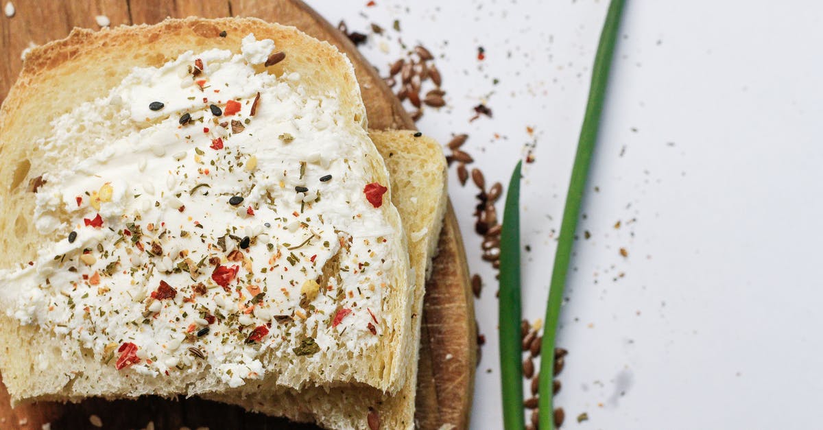 How to remove unwanted aftertaste from food - A Sliced Bread with Cream on a Wooden Board