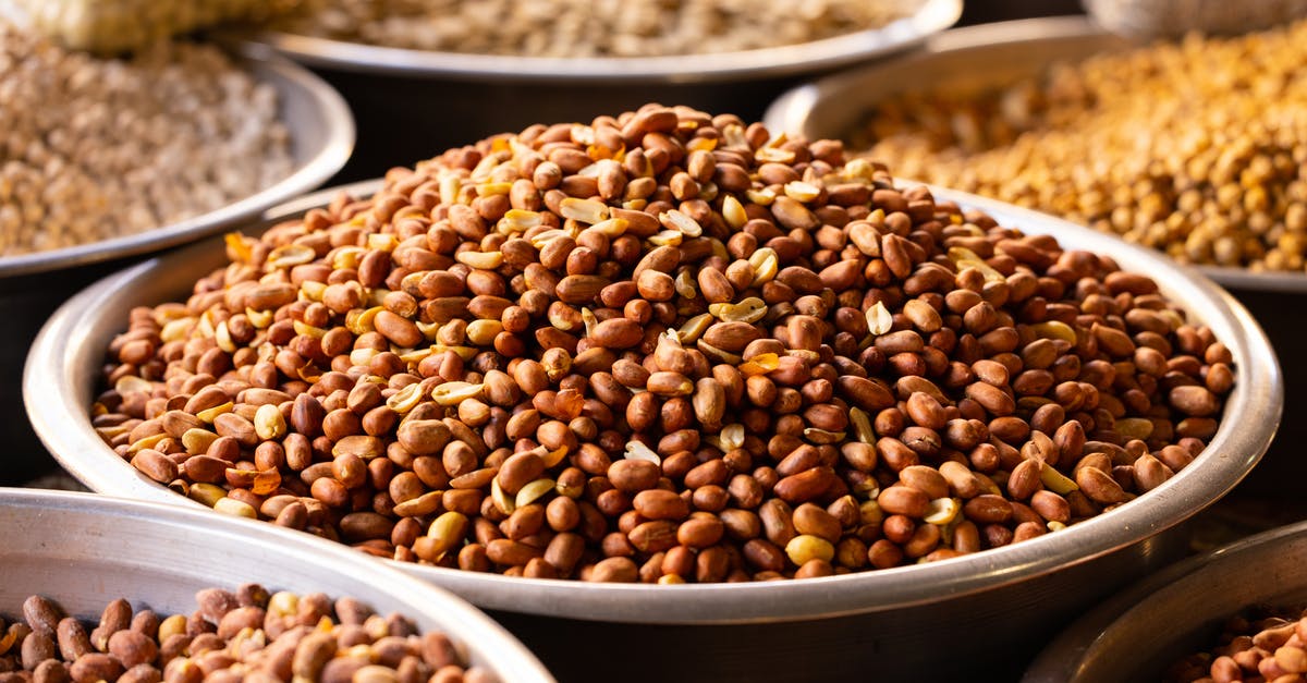 How to roast peanuts for peanut butter? - Roasted Nuts on Stainless Bowls