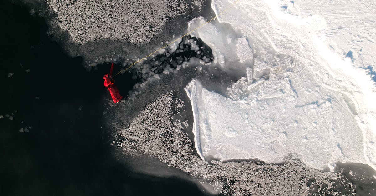 how to season a frozen steak - A Person in Red Jacket Climbing a Snow Covered  Mountain