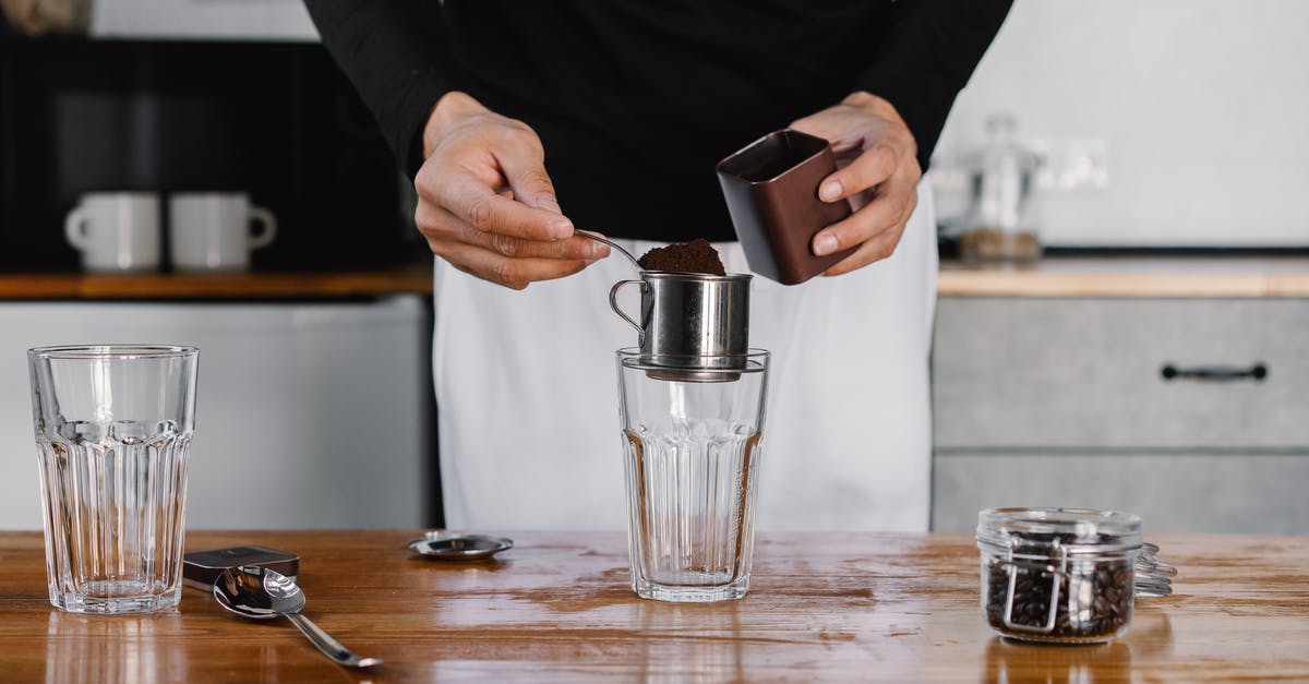 How to select a coffee powder for preparing Turkish Coffee? - Close-up Photo of Person making Coffee 