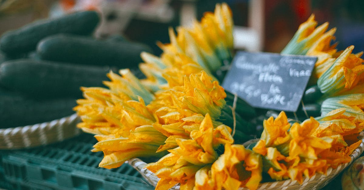 How to select a good non-stick pan, price point wise? - Zucchini flowers with price at counter in market