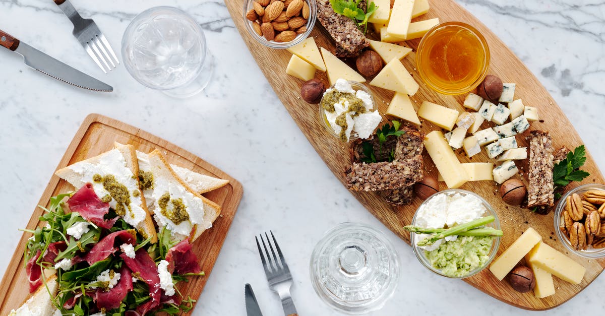 How to separate meat from vegetables in a soup? - Photo Of Sliced Cheese On Wooden Surface