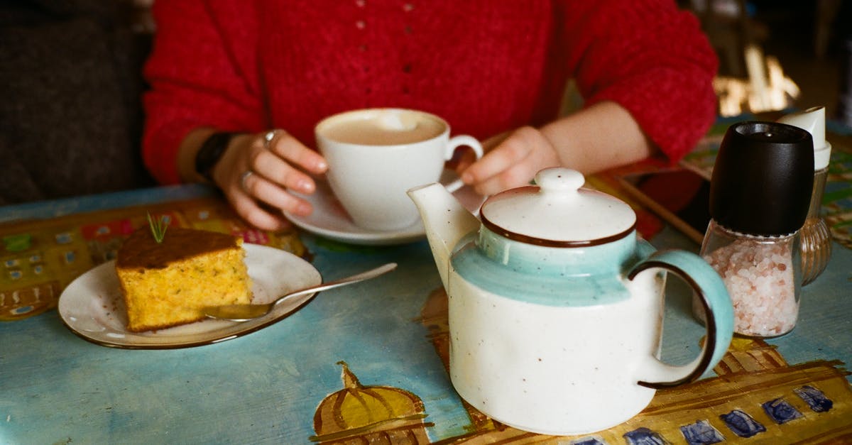 How to separate salt from chocolate? - Unrecognizable woman with coffee and delicious cake in cafe