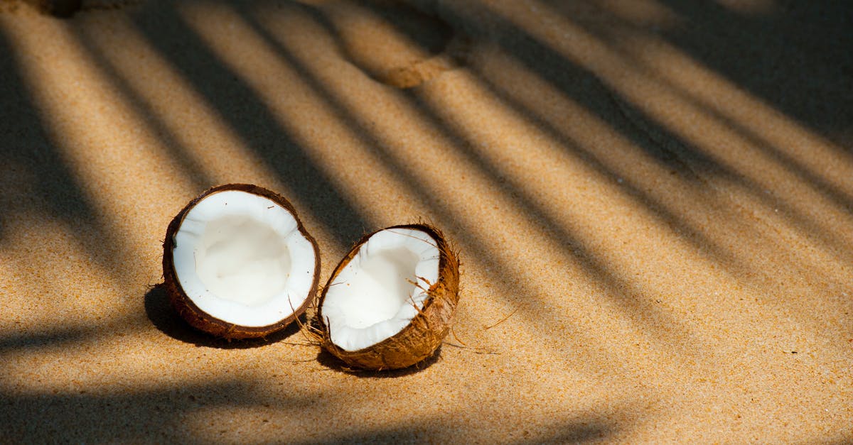 How to shell a coconut without breaking the seed? - Opened Coconut on Sands