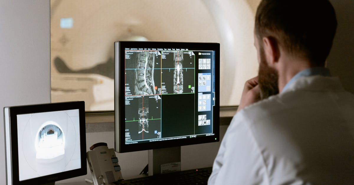 How to simmer bone broth safely with an overnight pause? - Photo Of Doctor Looking Deeply Unto The Screen 