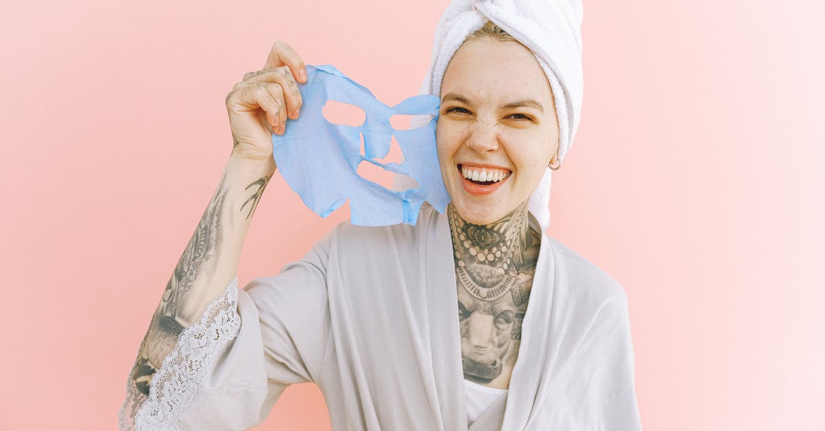 How to take care of a sourdough starter? - Happy woman removing face mask after taking bath