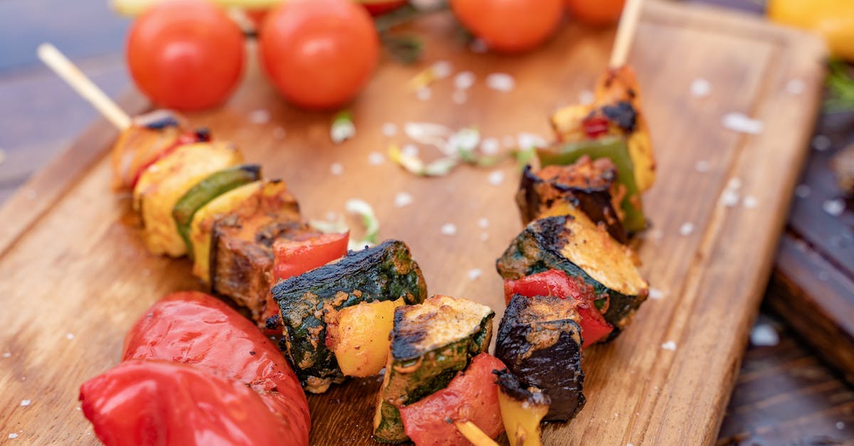 How to tell when roasted bell peppers are ready to skin? - Close-Up Photo Of Skewers