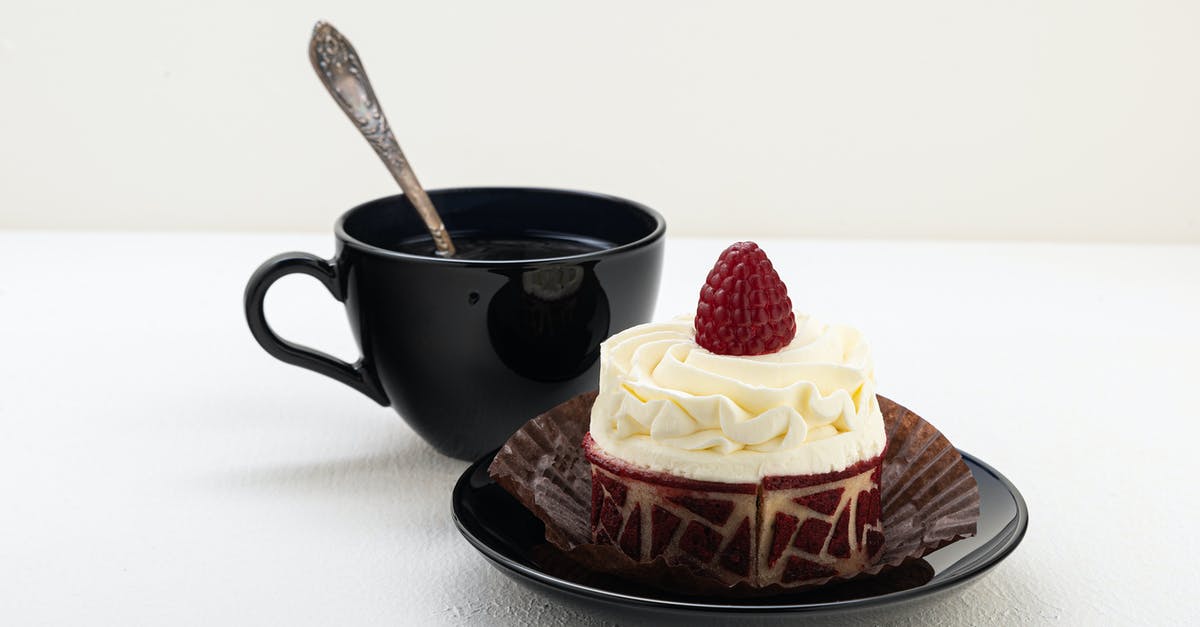 How to thicken a sour cream-based pastry cream? - Black Ceramic Mug on Brown Ceramic Saucer