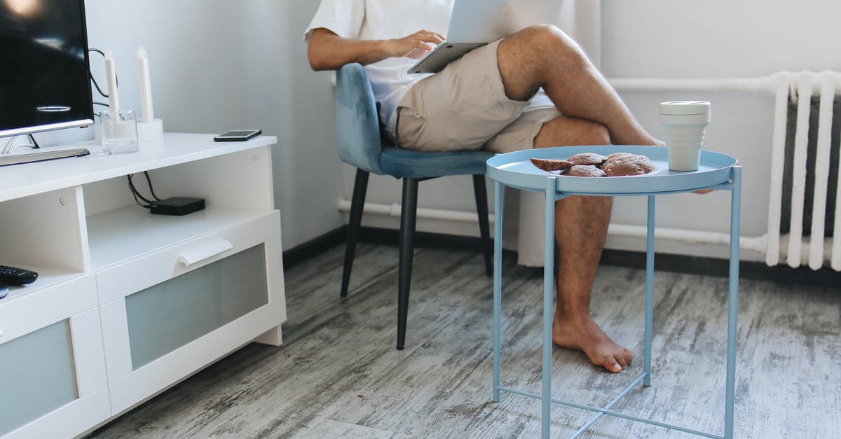 How to toughen cookies - Man in White T-shirt Sitting on White Plastic Chair