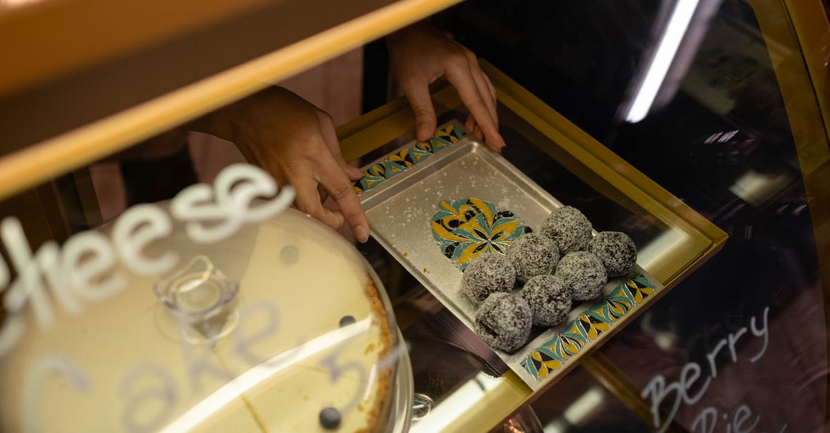 How to unbake a cake? [closed] - Person Holding White and Brown Ceramic Plate