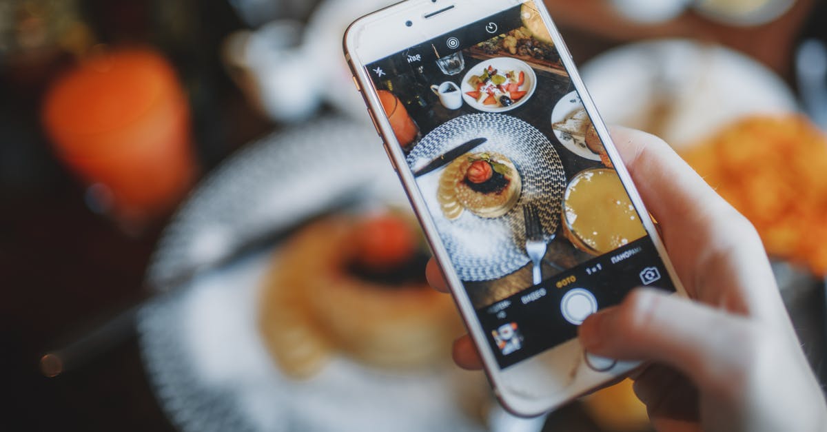 How to use knife - Crop person taking photo of food on smartphone of food