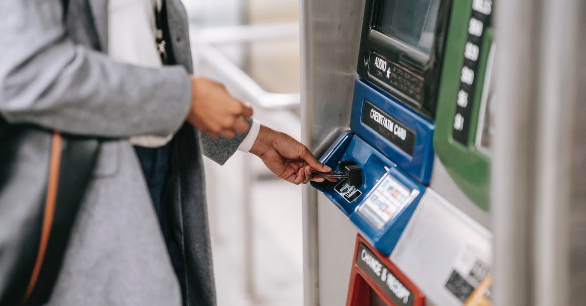 How to Use Ravioli Maker without Press Insert - Side view of crop unrecognizable female in stylish clothes using credit card while buying metro ticket via electronic machine