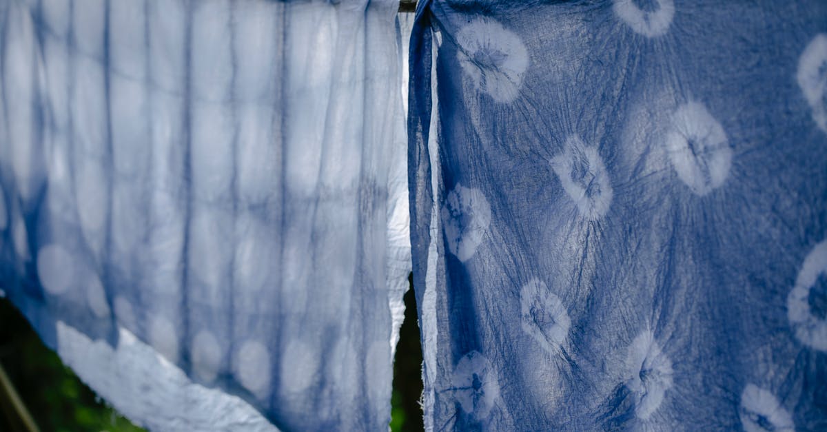 How to wash soft fruit? - Clean fabric drying on clothesline on sunny day