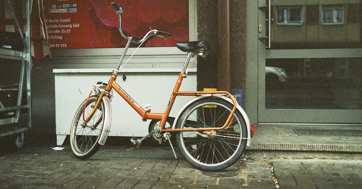 I have an old pyrex bowl with a detachable handle with a glass inset - From above of aged bike with leather seat parked on shabby tiled street pavement near glass door reflecting building with windows in city in daylight I have an old pyrex bowl with a detachable handle with a glass inset - From above of aged bike with leather seat parked on shabby tiled street pavement near glass door reflecting building with windows in city in daylight