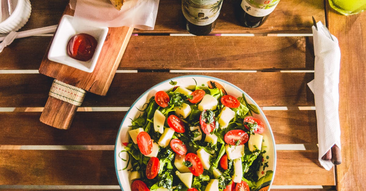 I used olive oil to finish my salad serving utensils - now what? - Healthy vegetable salad with cherry tomatoes and mix leaves