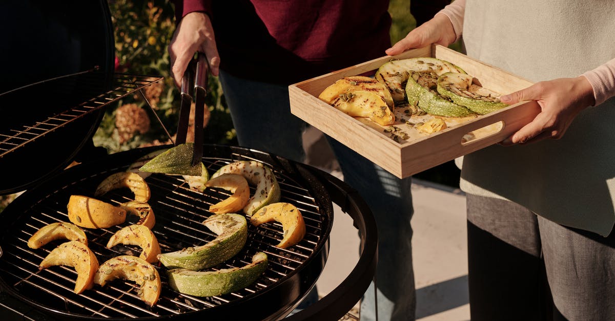 I would like to try grilling fruit - any suggestions? [closed] - Close-Up Shot of Person Grilling Fruits