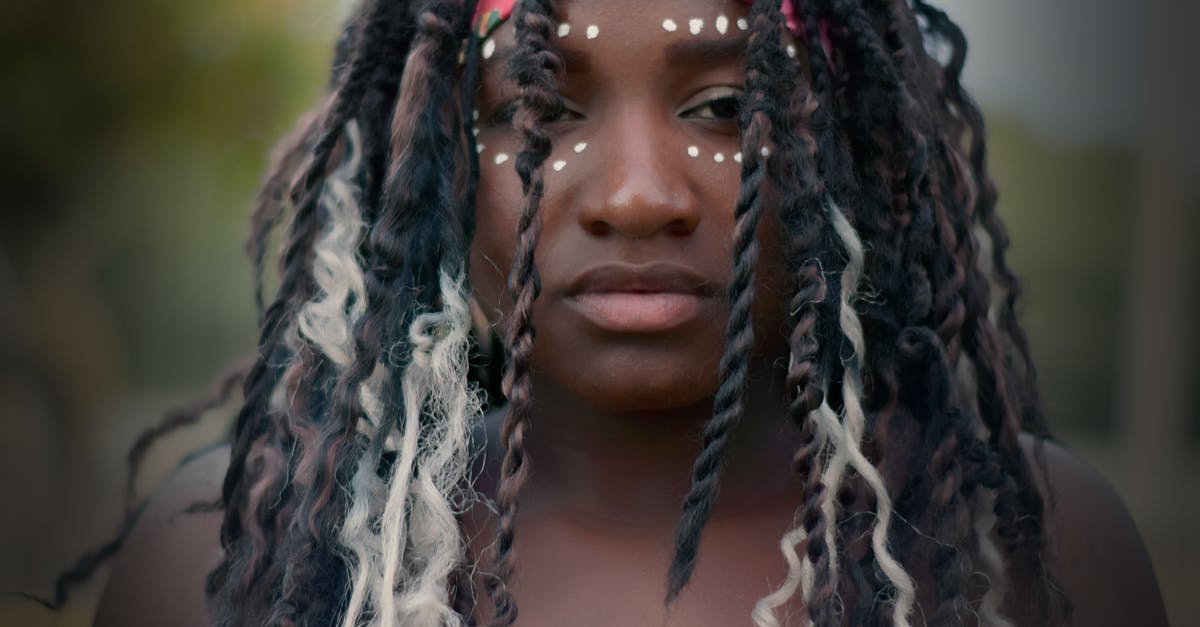 Identity of "Kulkie" - Woman in Black and White Braided Hair