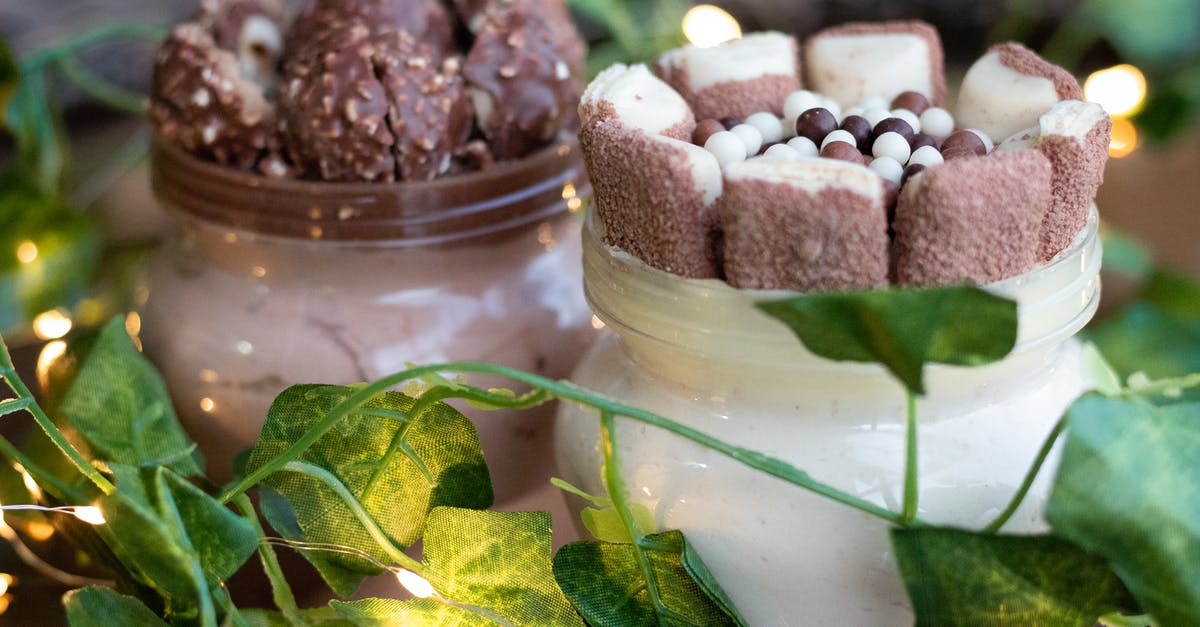 Increase lifetime of homemade chocolates - Chocolate Sweets On Glass Jars