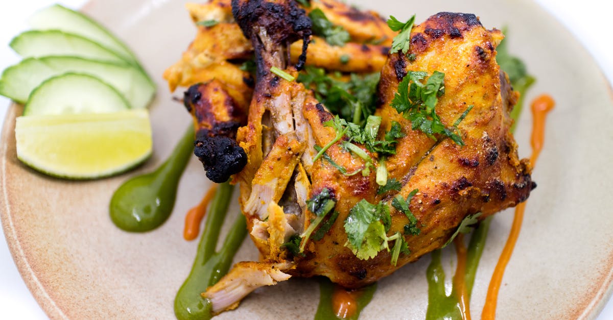 Indian Cuisine - Atta Chicken - Fried Chicken with Green Sauce on White Ceramic Plate