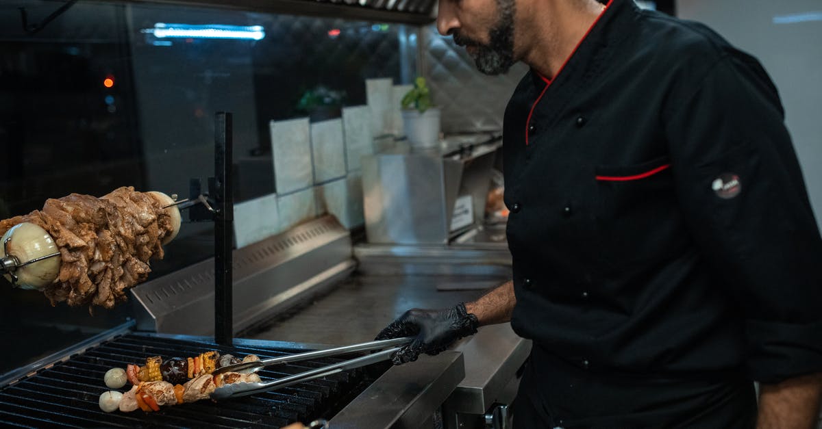 indoor grilling - A Man in Black Chef Jacket