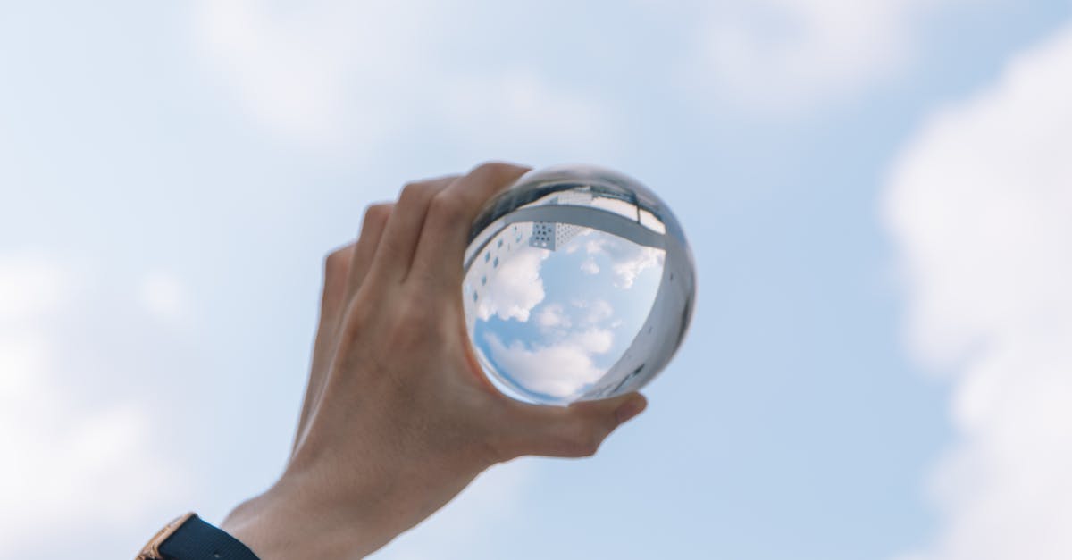 Inversion Canning - Crop male holding glass bulb in hand