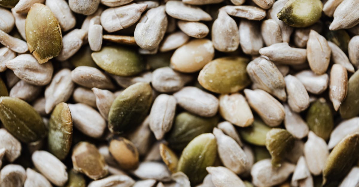 Is a seed different from a nut? - Pile of different pumpkin seeds