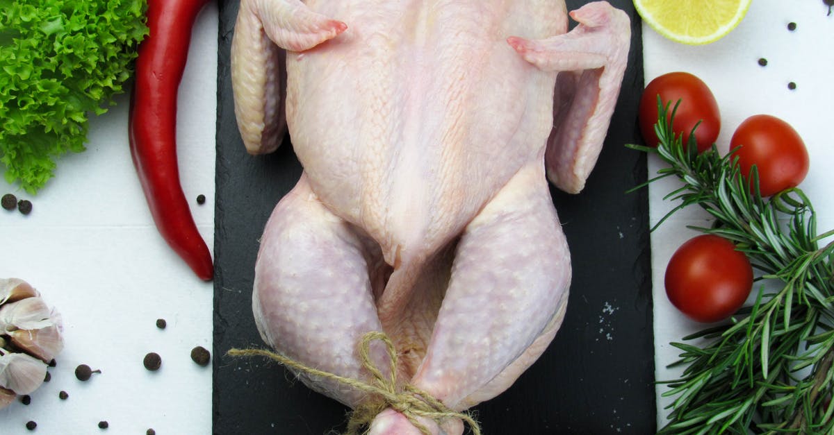 Is acid-marinated raw chicken still safe after several days? - Close-up of a Raw Whole Chicken