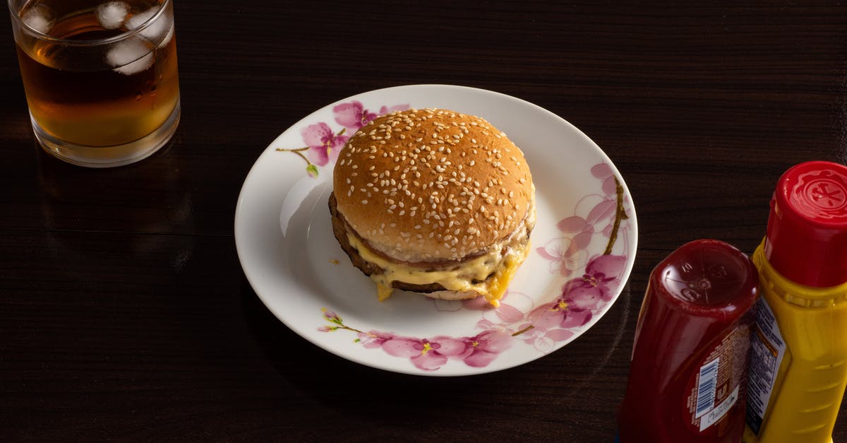 Is cheese a condiment? (Burgers, sandwiches, etc) - Hamburger on White and Pink Floral Plate