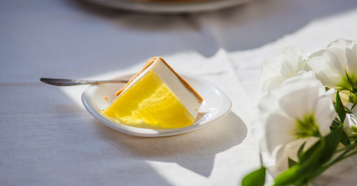 Is high gelatin concentration in cheesecake unsafe?  - Tasty cheesecake near decorative flowers on table