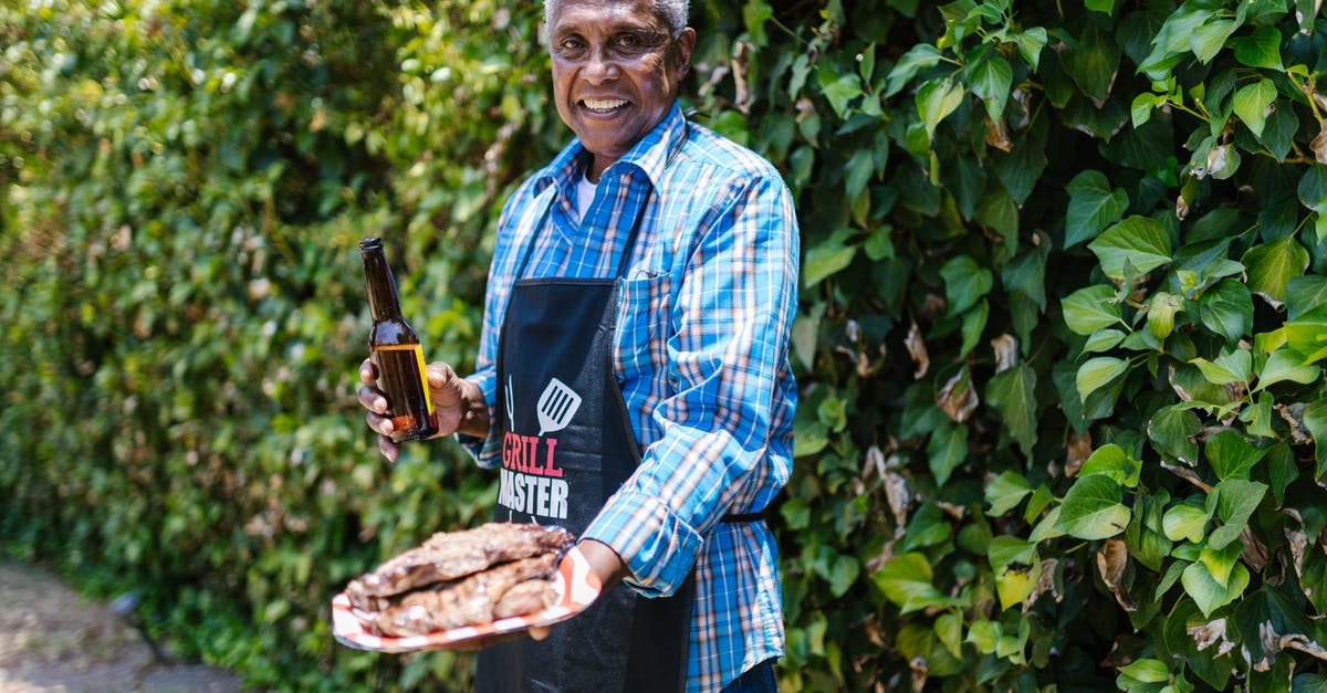 Is it bad to marinate meat for too long? - An Elderly Man in Plaid Long Sleeves Holding a Plate with Steak