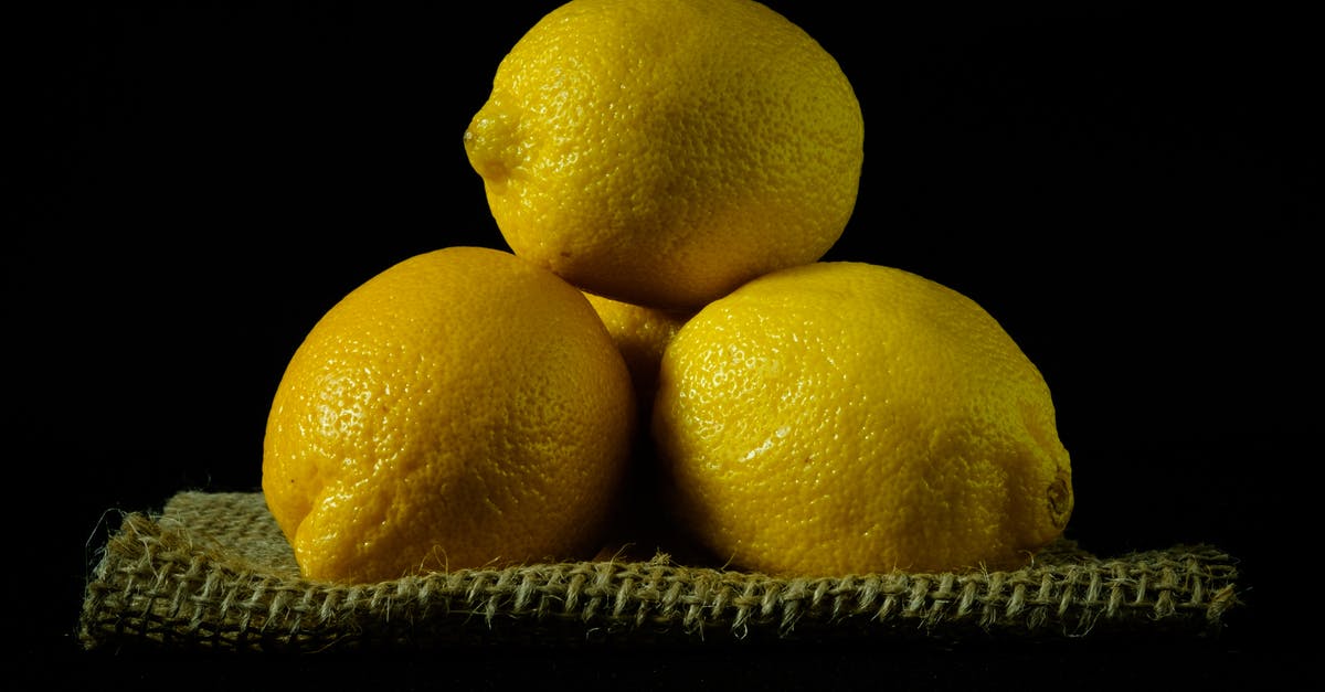 Is it okay for preserved lemons to float? - Yellow Lemon Fruit on Black Textile