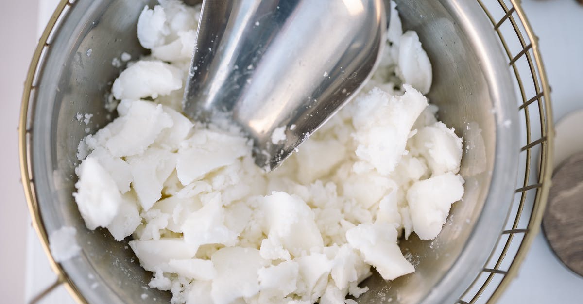 Is it okay to boil milk (making steel cut oats) - Stainless Steel Spoon on White Rice