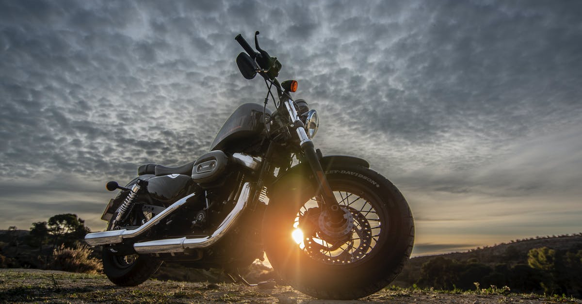 Is it okay to marinate brisket for 48 hours? - Low Angle Photo of Black Harley Davidson Forty-Eight 1200 Motorcycle Parked on Dirt Road During Golden Hour