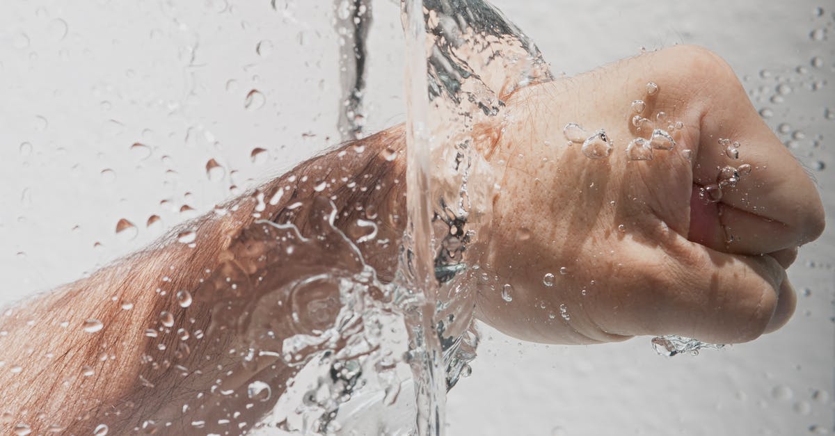 is it okay to wash vegetables by soaking/submerging? - Person's Left Fist Punching Water