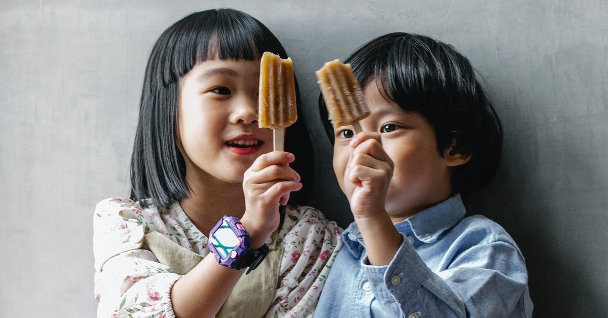 Is it possible to create salty ice cream? - Little Asian kids showing ice creams