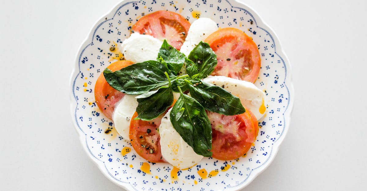 Is it possible to get vegetarian grana padano cheese? - Vegetable Salad on White and Blue Round Floral Plate