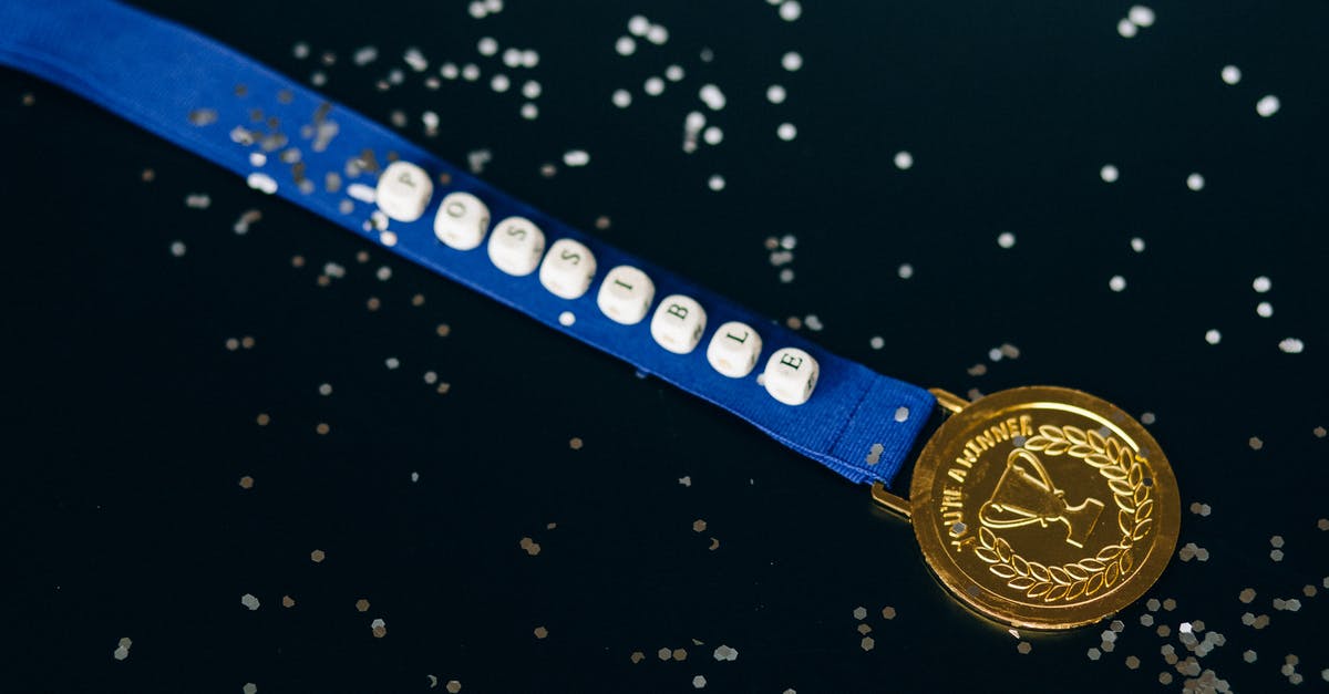 Is it possible to overcook peas? - Close-Up Shot of a Gold Medal on a Black Surface