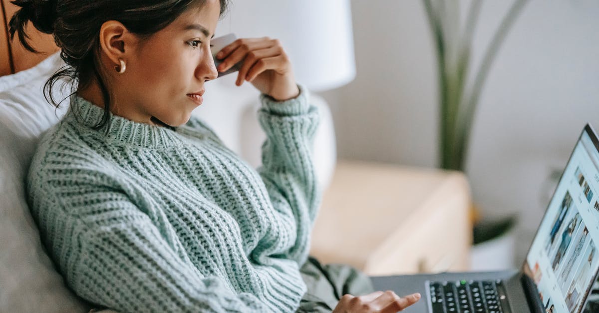 Is it possible to purchase Disodium Ribonucleotides (E635) in consumer/small quantities? - Side view of crop concentrated young ethnic female using touchpad of netbook and shopping online