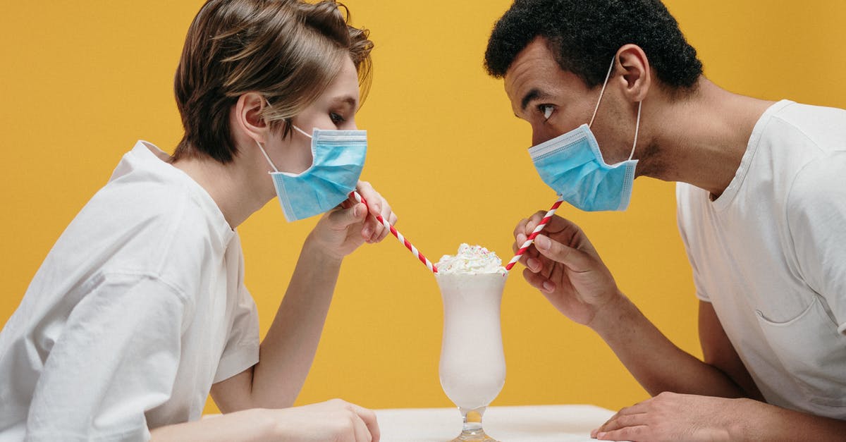 Is it safe to drink the whey? - Couple Wearing Face Mask Drinking Milkshake