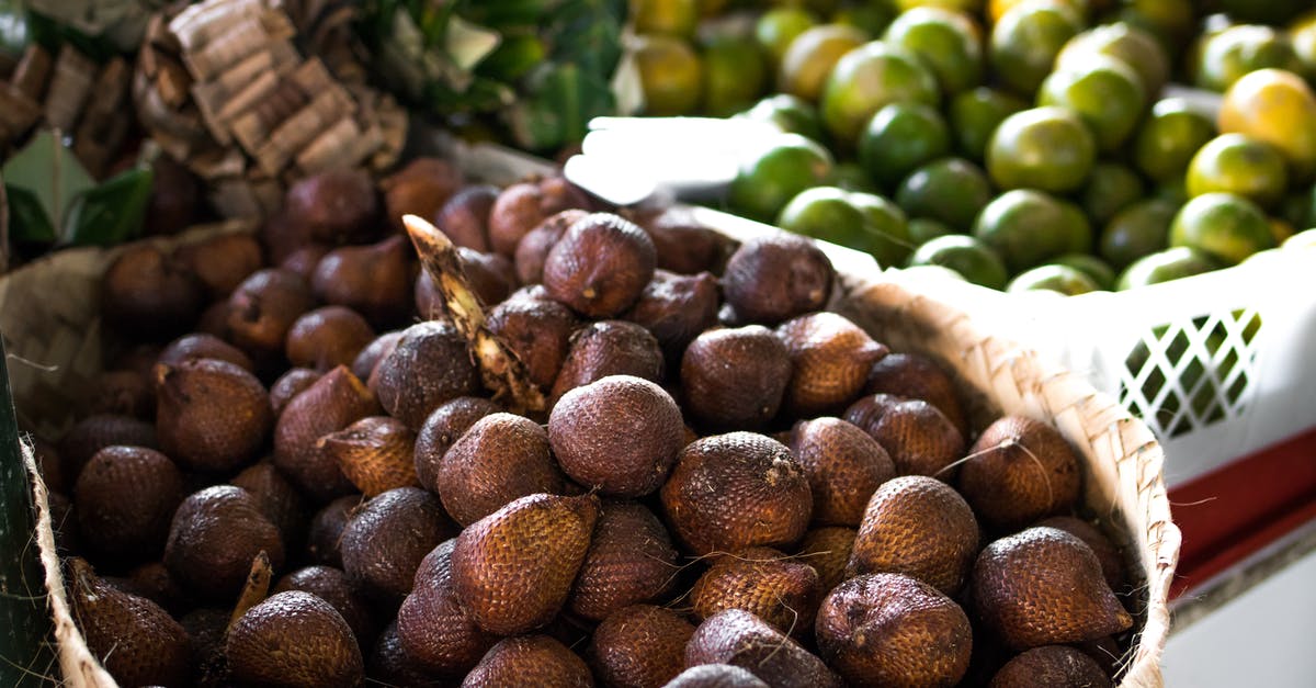 Is it safe to eat the skin of a potato? [duplicate] - Pile of Brown Fruit With Brown Basket