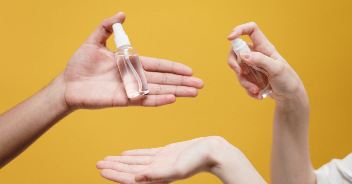 Is it safe to not wash mushrooms? - People Holding Clear Glass Bottle