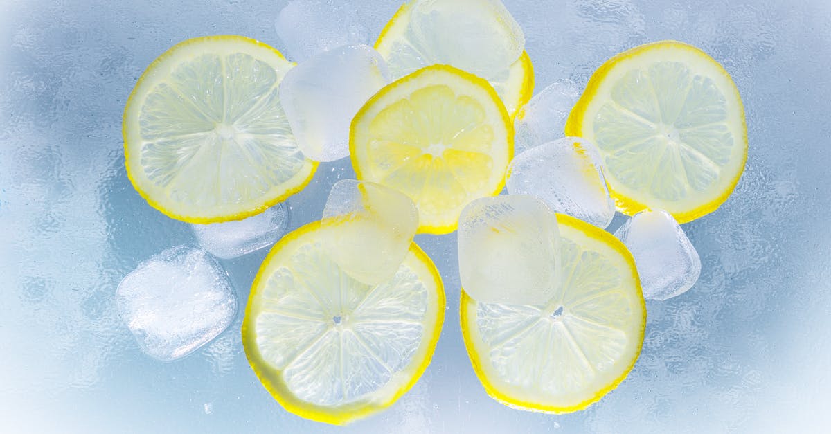 Is it safe to refreeze ice cubes? - Sliced Lemon on Ice Water