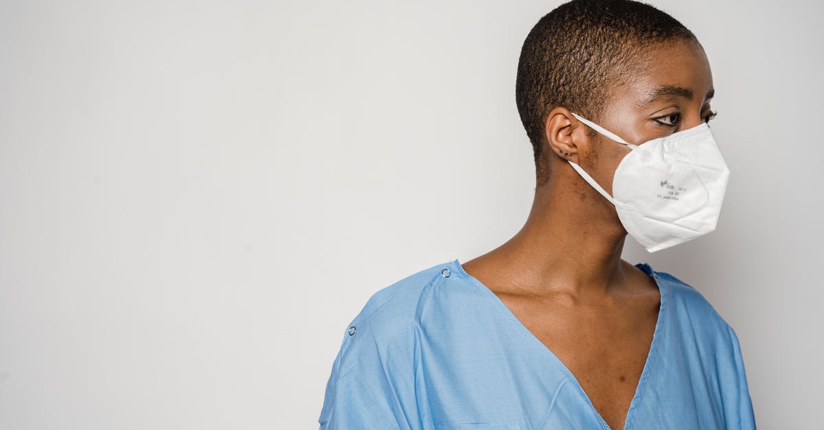 Is jerky safe concerning parasites? - Black woman patient in mask looking away in light room