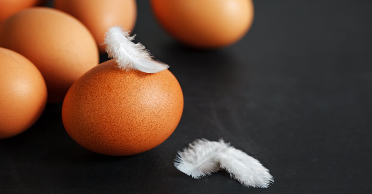 Is Light Egg Nog supposed to drink directly without cooking? - Chicken eggs placed on black table