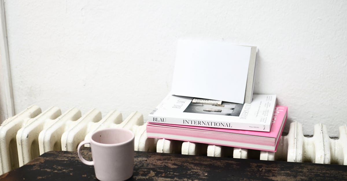 Is old brewed coffee too unsafe to drink? - Ceramic cup on table near radiator with books